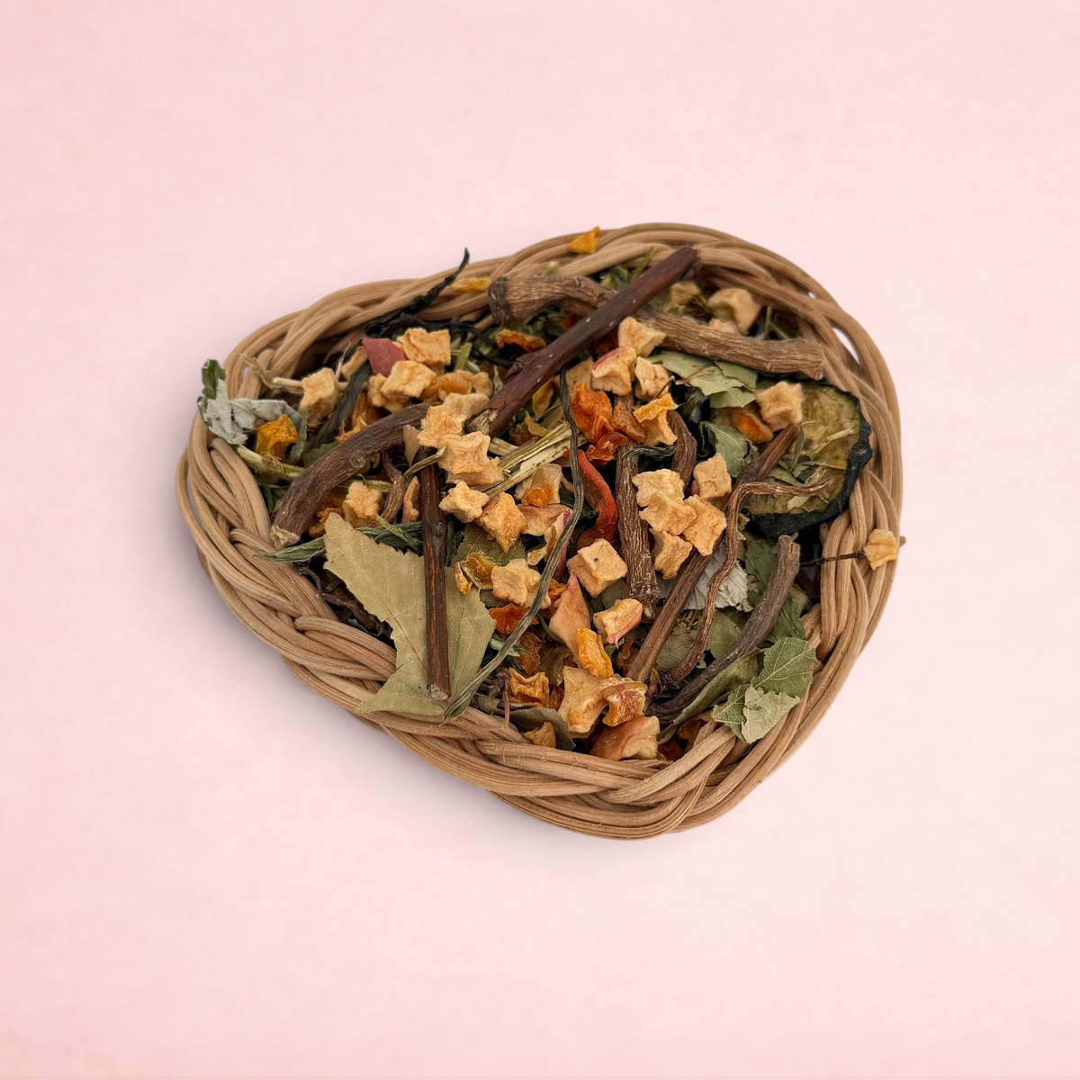 Darling Bun Shop autumnal heart-shaped natural vine basket filled with dried forage, apple, and pumpkin treats.