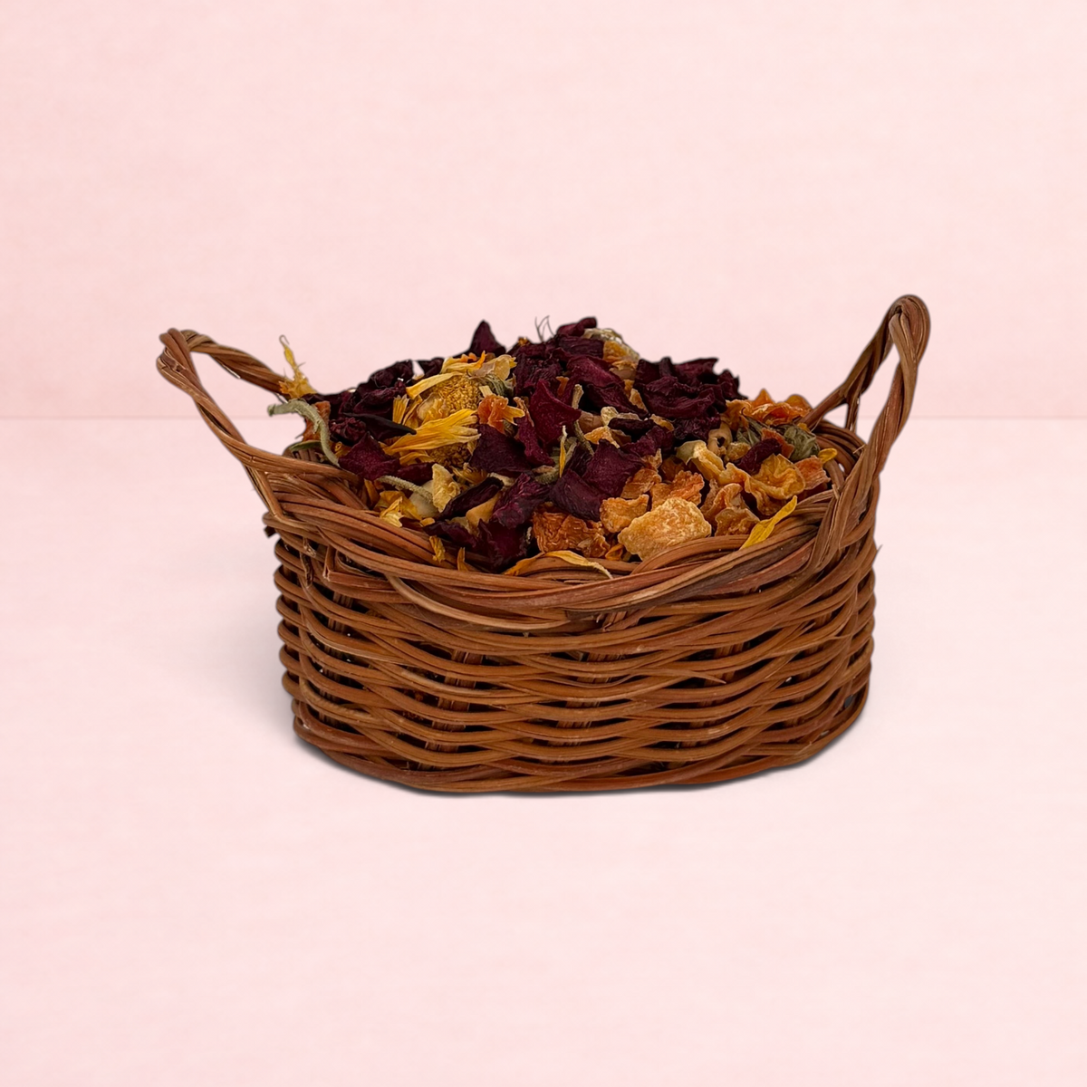 Darling Bun Shop natural vine trick or treat basket filled with beetroot, pumpkin, and marigold for small animals.