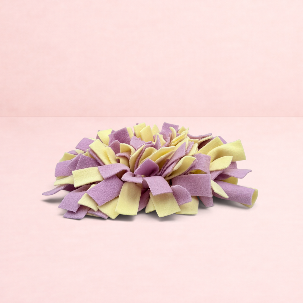Darling Bun Shop purple and yellow felt snuffle mat for small pets to encourage foraging and slow eating