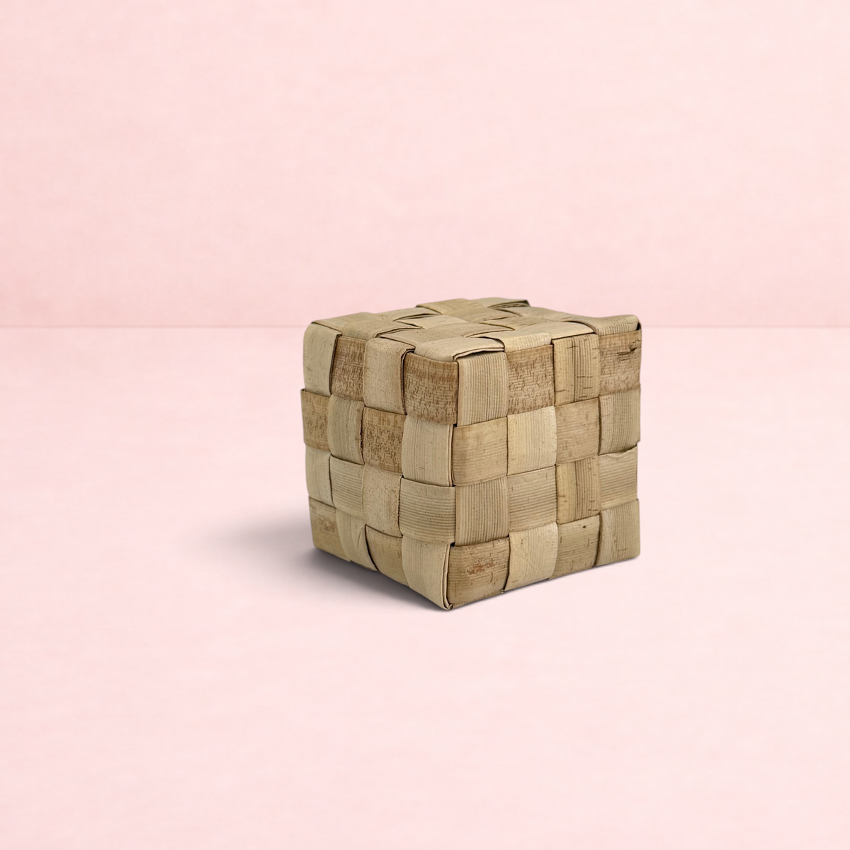 Darling Bun Shop natural woven palm leaf cube chew toy for rabbits and small pets on a white background