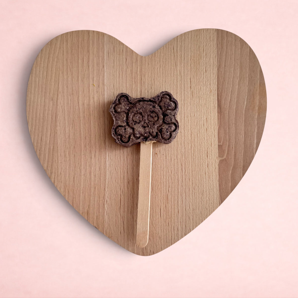 Darling Bun Shop handmade blueberry bat Halloween lolly treat for small pets on a wooden heart board