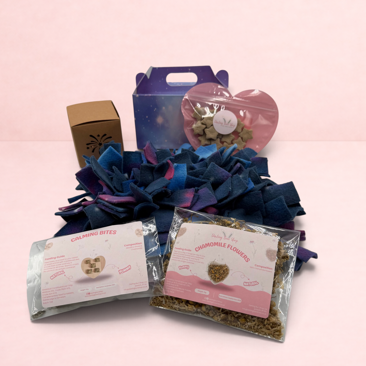 Darling Bun Shop Calming Bonfire Bundle with galaxy snuffle mat, oat stars, calming bites, and chamomile flowers.