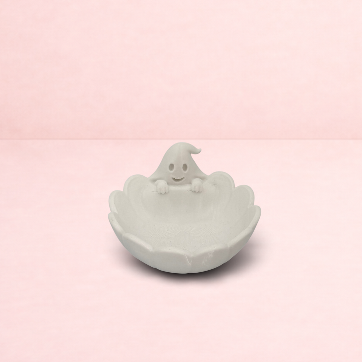 Darling Bun Shop white plastic ghost pellet bowl for small pets, featuring a cute ghost figure for Halloween.