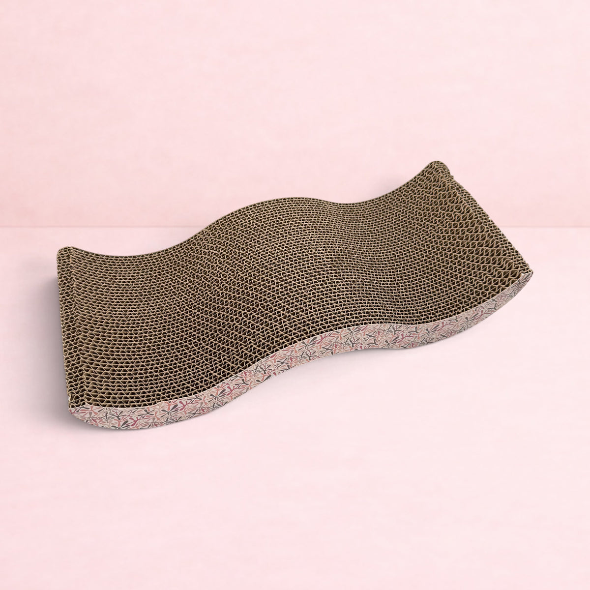 Darling Bun Shop pink wave-shaped cardboard scratching board for rabbits to dig, chew, and rest on.