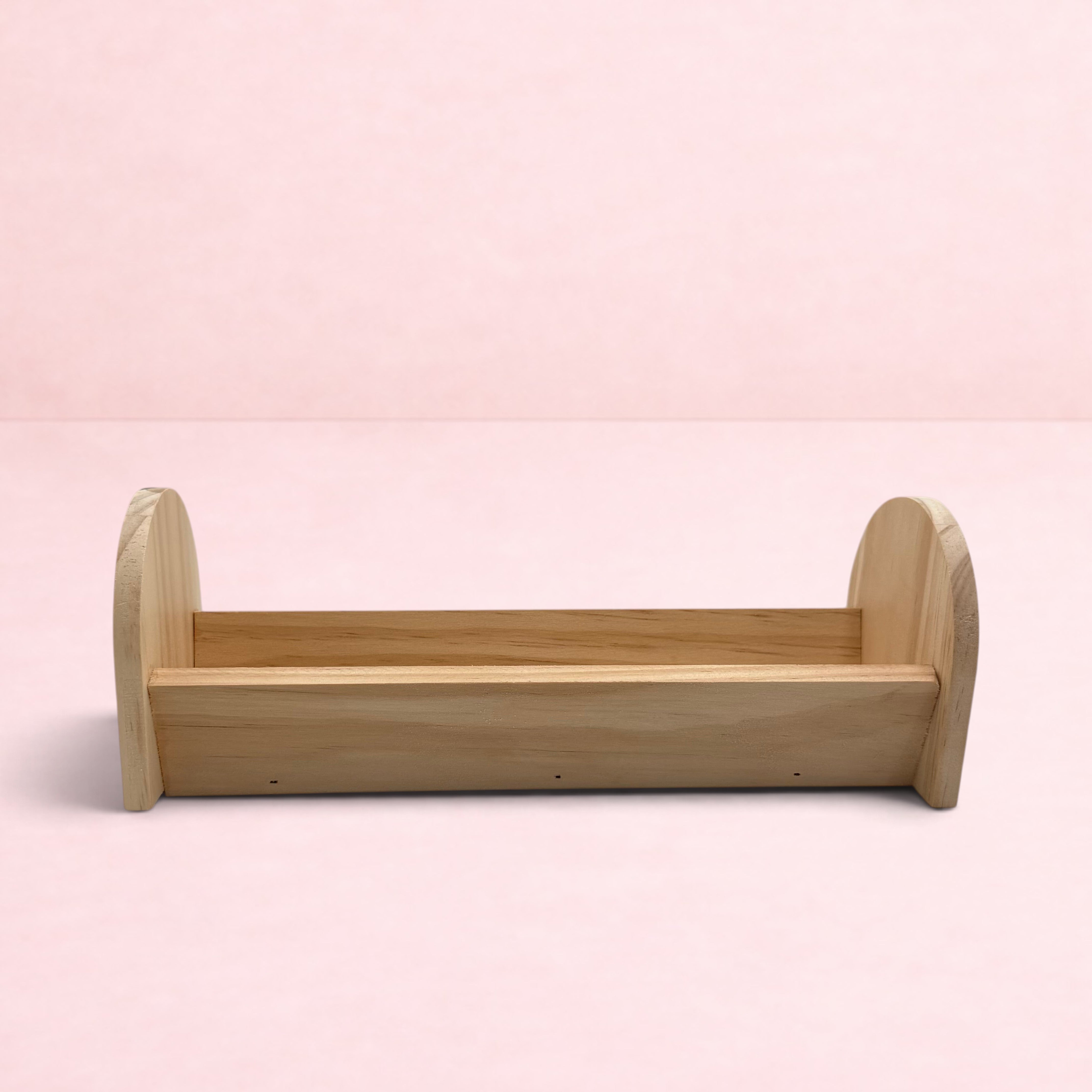 Darling Bun Shop natural wooden feeding trough for bunnies, perfect for holding hay and fresh vegetables.
