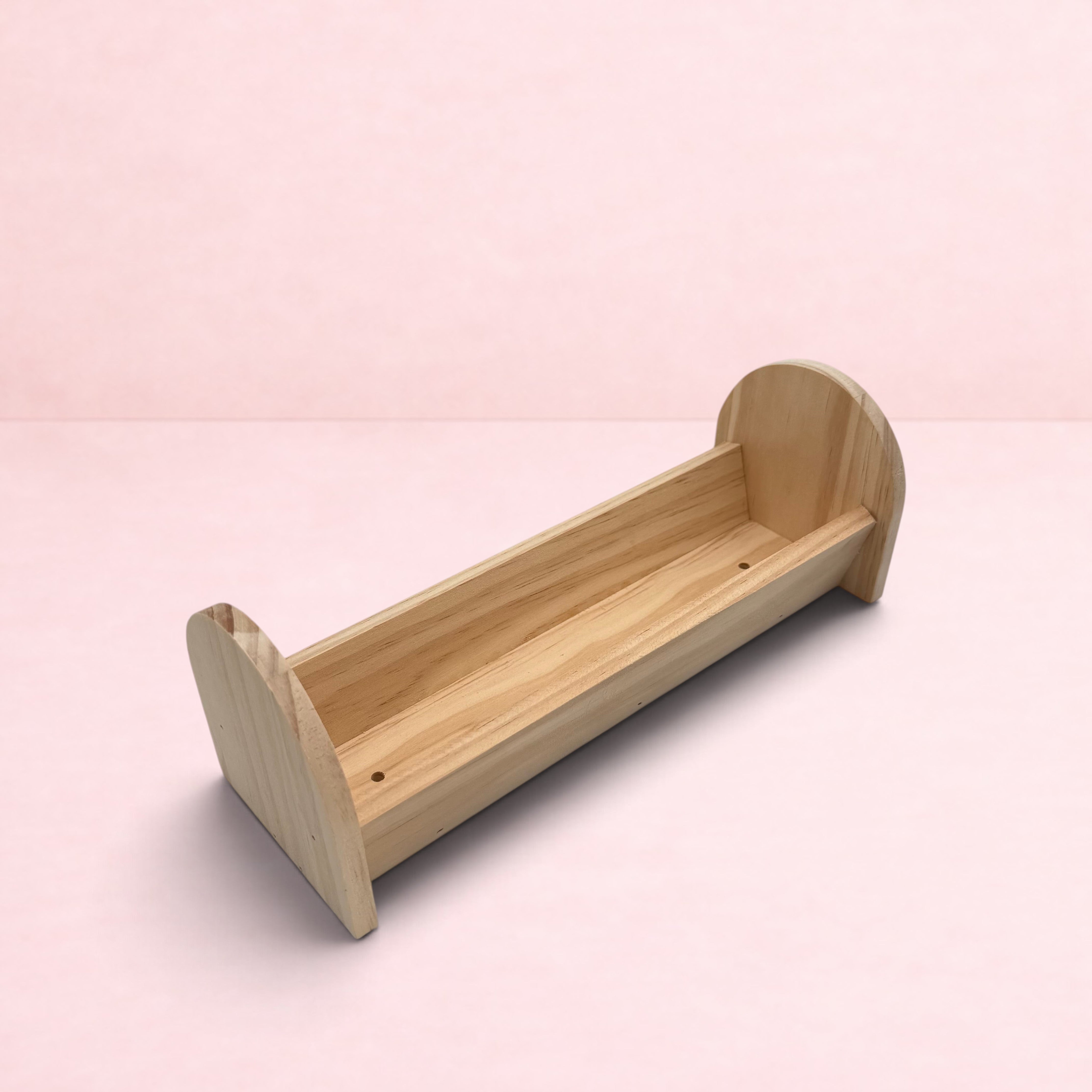 Darling Bun Shop natural wooden feeding trough for bunnies, perfect for hay and fresh vegetables.