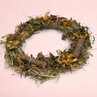 Darling Bun Shop autumn wreath made of palm leaf, timothy hay, parsley, and marigold flowers for small pets