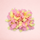 Darling Bun Shop pink and yellow fabric snuffle mat for small pets to encourage natural foraging and slow feeding.