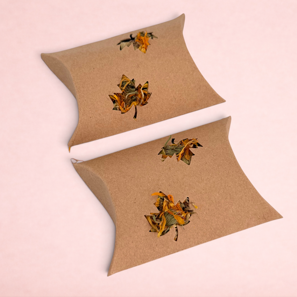 Darling Bun Shop maple leaf boredom breaker pillows made of brown cardboard with dried flower forage cutouts