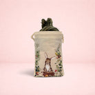 Darling Bun Shop Woodland Treat Sack with bunny illustration, containing timothy hay chews for small animals