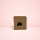 Darling Bun Shop autumn boredom breaker toy in a brown cardboard box with a hedgehog-shaped cutout for small pets
