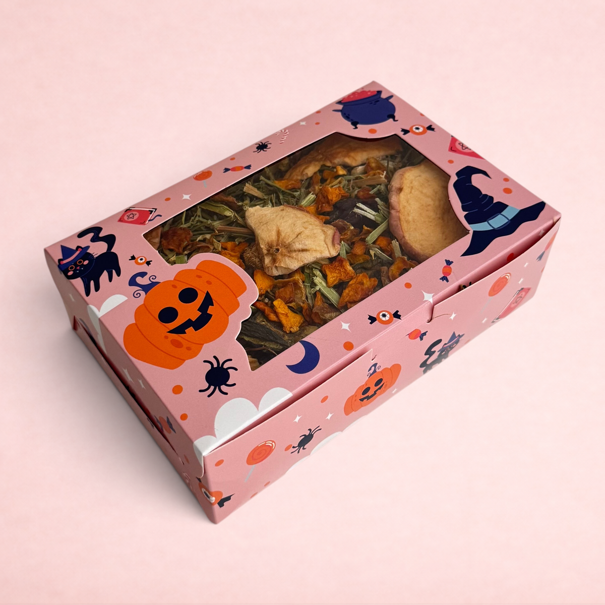 Darling Bun Shop Halloween forage box for small pets with timothy hay, pumpkin, and apple slices in a festive box.