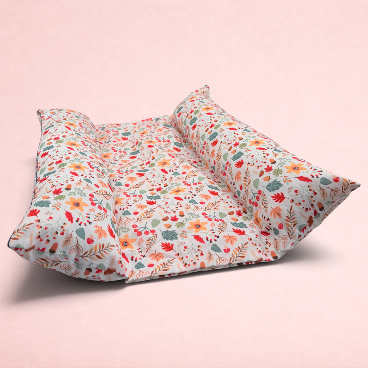 Darling Bun Shop handmade bunny bed with autumn acorn and oak leaf print and two raised pillow sides for comfort.