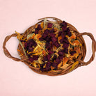 Darling Bun Shop natural vine trick-or-treat basket filled with dried beetroot, pumpkin, and marigold for rabbits.