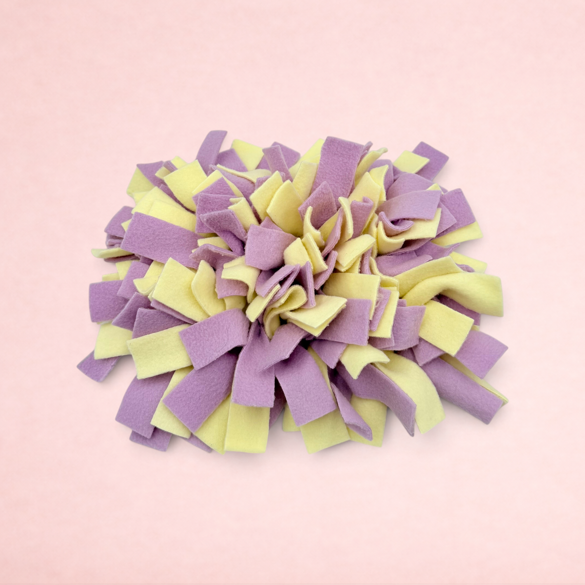 Darling Bun Shop purple and yellow felt snuffle mat for small pets to encourage natural foraging and slow eating.