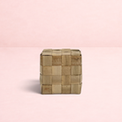 Darling Bun Shop natural woven palm leaf cube chew toy for rabbits and small pets on a white background