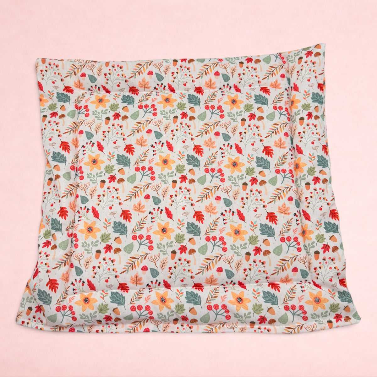 Darling Bun Shop handmade square pet cushion featuring an autumn-themed pattern of acorns, oak leaves, and flowers.