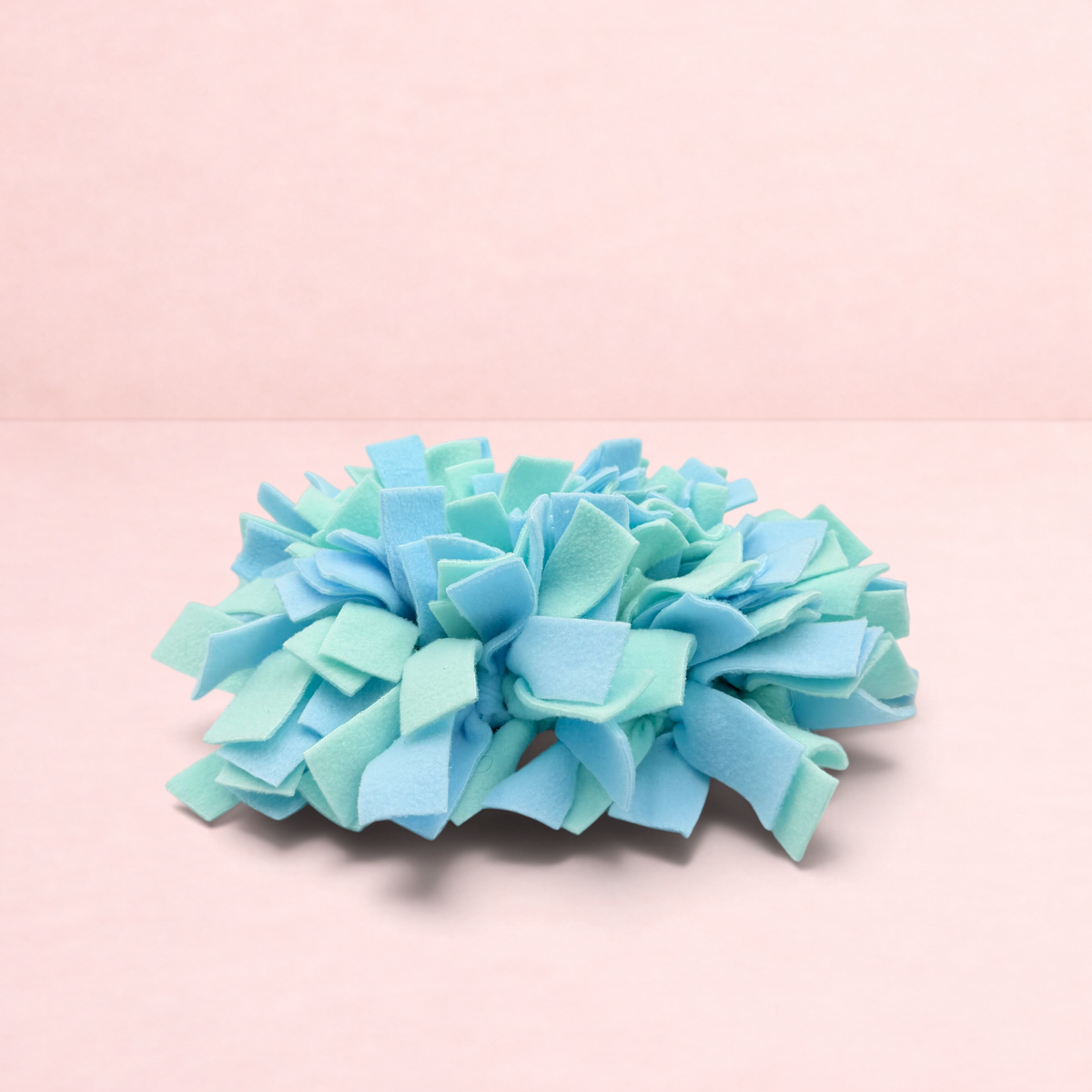 Darling Bun Shop blue and green felt snuffle mat for small pets to encourage foraging and slow feeding
