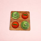 Darling Bun Shop wooden Veg Patch Puzzle toy with vegetable-shaped treat hiding domes for rabbit enrichment