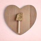 Darling Bun Shop handmade ghost-shaped oat lolly treat for rabbits and small pets on a wooden stick