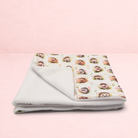 Darling Bun Shop handmade small pet blanket with an autumnal hedgehog print and soft white fleece lining.