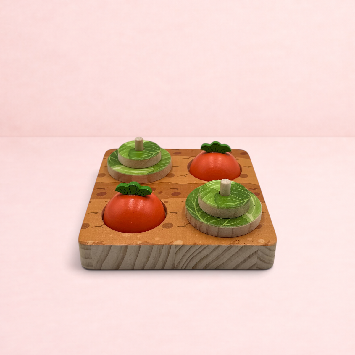 Darling Bun Shop wooden veg patch puzzle toy with colourful vegetable-shaped treat hiding domes for rabbit foraging.