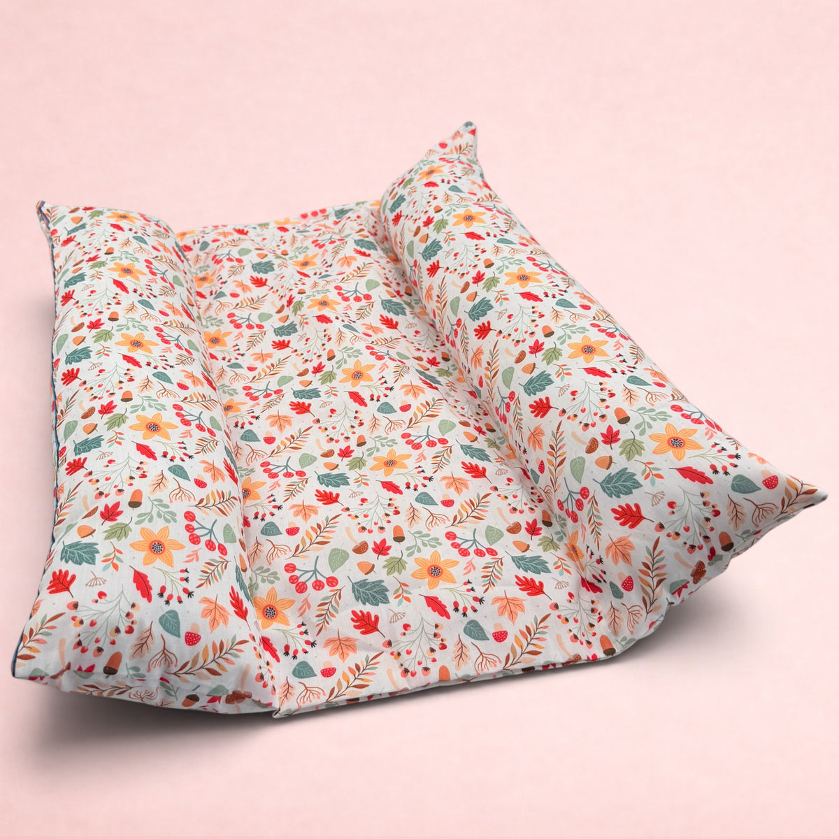 Darling Bun Shop handmade rabbit bed with autumn acorn and oak leaf print and two raised pillow sides for comfort