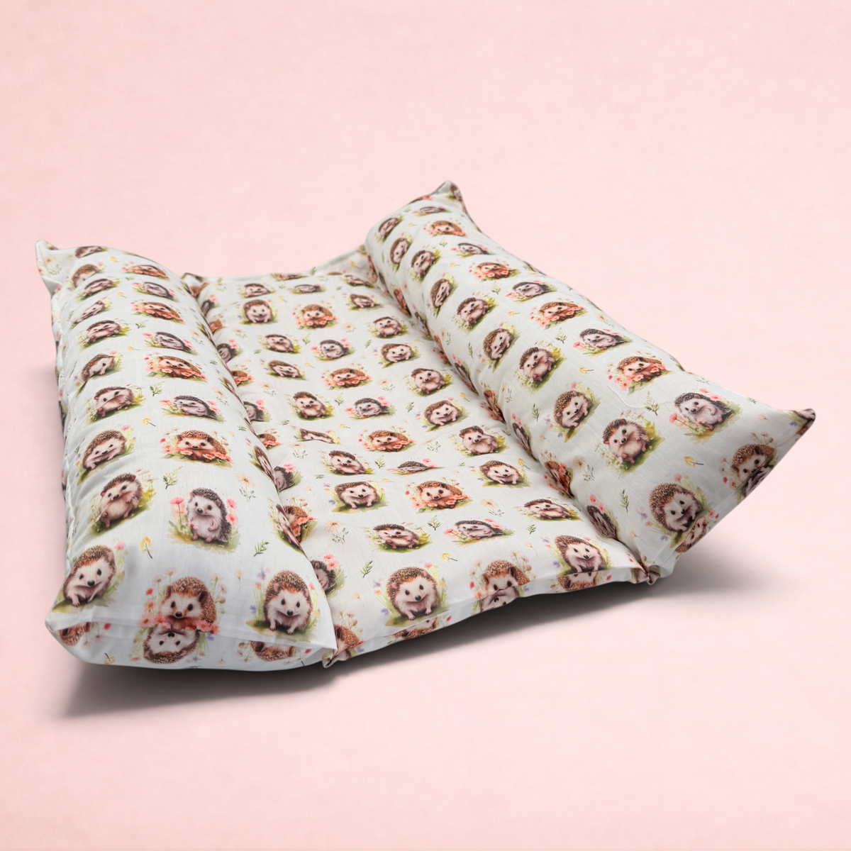 Darling Bun Shop Autumnal Hedgehogs Snuggle & Flop Bed with raised sides and cute hedgehog print for rabbit comfort.