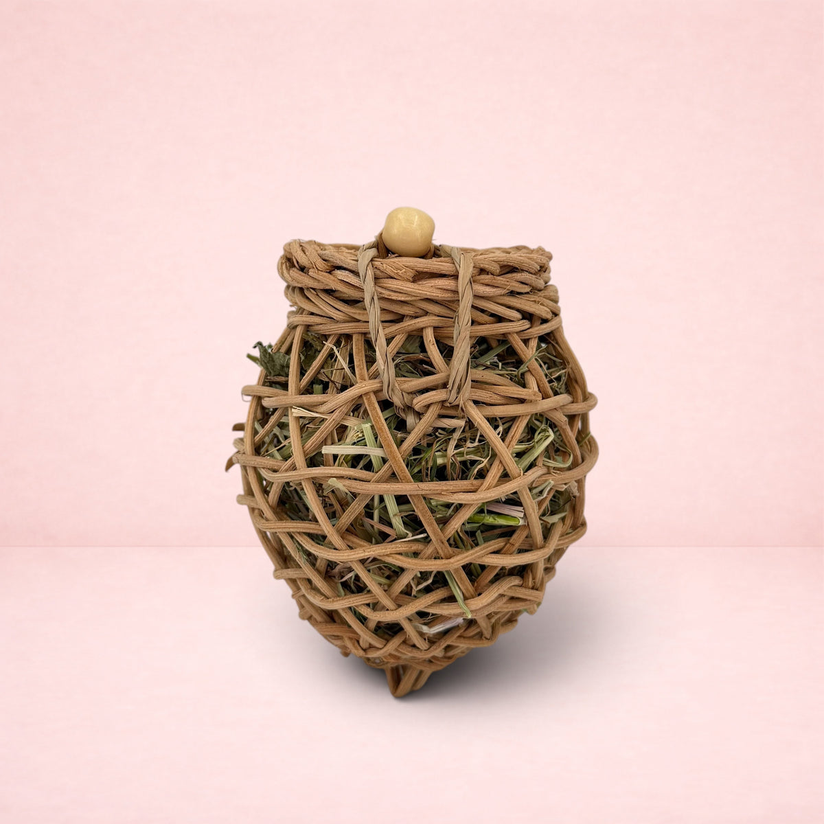 Darling Bun Shop natural vine acorn forage toy filled with timothy hay and dried herbs for small animals