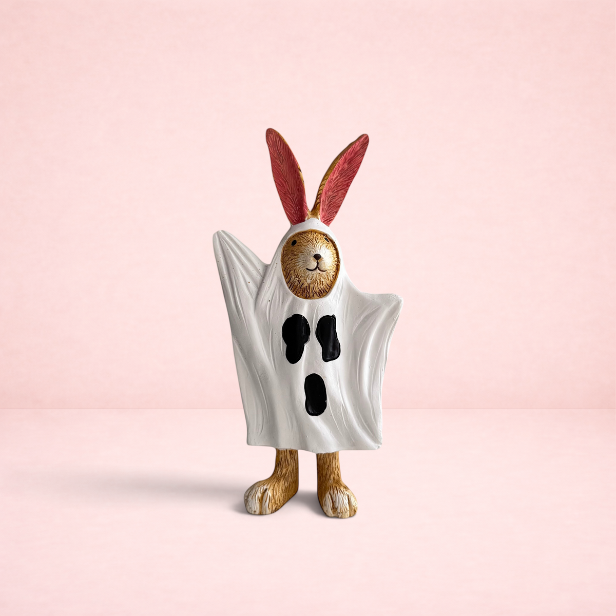 Darling Bun Shop handmade bunny ornament wearing a white ghost costume with black eyes and mouth for Halloween decor.