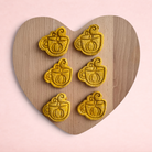 Darling Bun Shop handmade pumpkin spiced latte oat treats for rabbits shaped like coffee cups with pumpkin designs