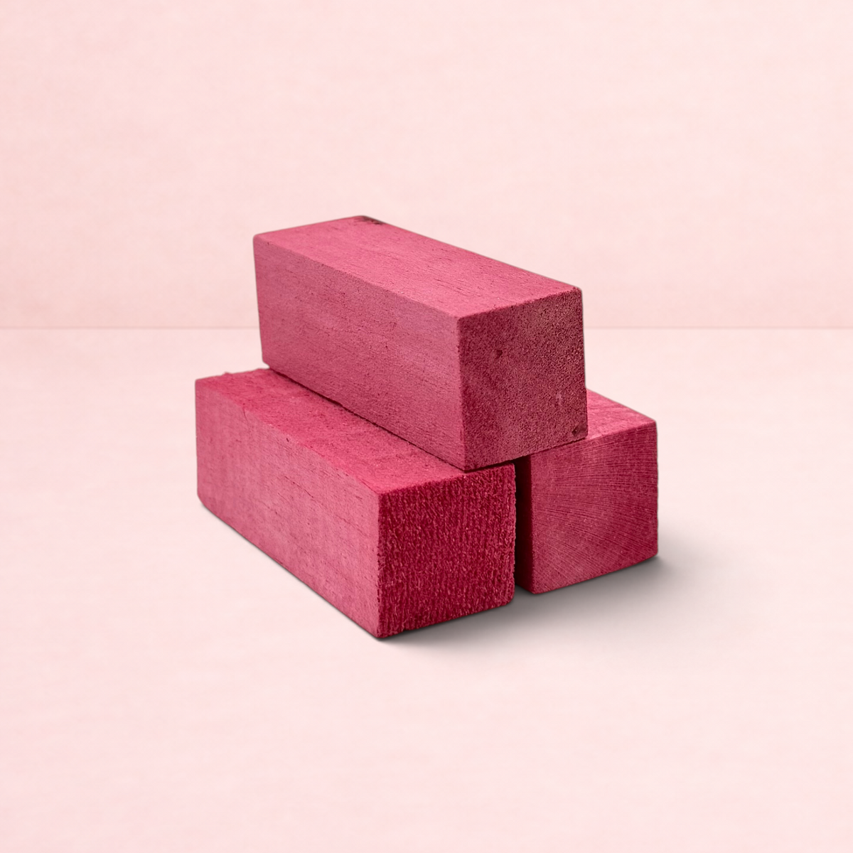 Darling Bun Shop blackberry-infused balsa wood chew blocks for small pets, stacked in a set of three.