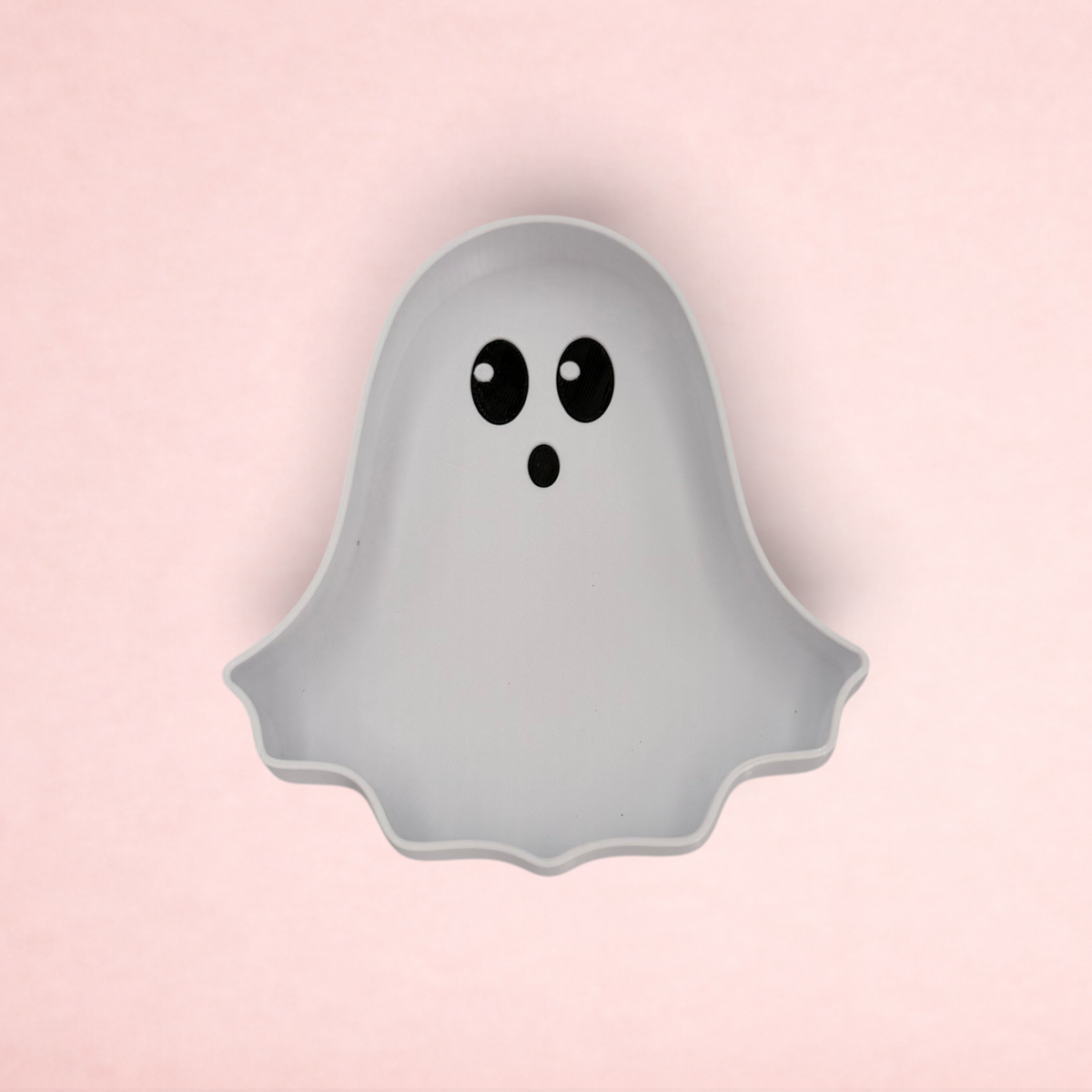 Darling Bun Shop white ghost-shaped plastic forage tray for rabbits and guinea pigs, perfect for Halloween treats.