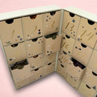 Darling Bun Shop 24 day reusable advent calendar with beige drawers containing dried forage for small pets