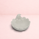 Darling Bun Shop white ghost-shaped plastic pellet bowl for small pets, perfect for Halloween treats.