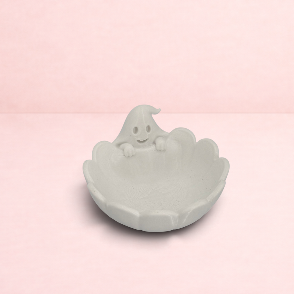 Darling Bun Shop white ghost-shaped plastic pellet bowl for small pets, perfect for Halloween treats.