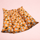 Darling Bun Shop Halloween Hoppy Haunting Snuggle & Flop Bed with orange ghost and bat print for pet rabbits