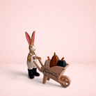 Darling Bun Shop handmade bunny ornament pushing a wooden wheelbarrow filled with miniature pumpkins for Halloween