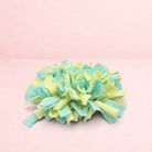 Darling Bun Shop yellow and green felt snuffle mat for small pets to forage for treats and slow down eating
