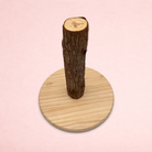Darling Bun Shop wooden natural feed tree for rabbit foraging with a round base and upright log trunk
