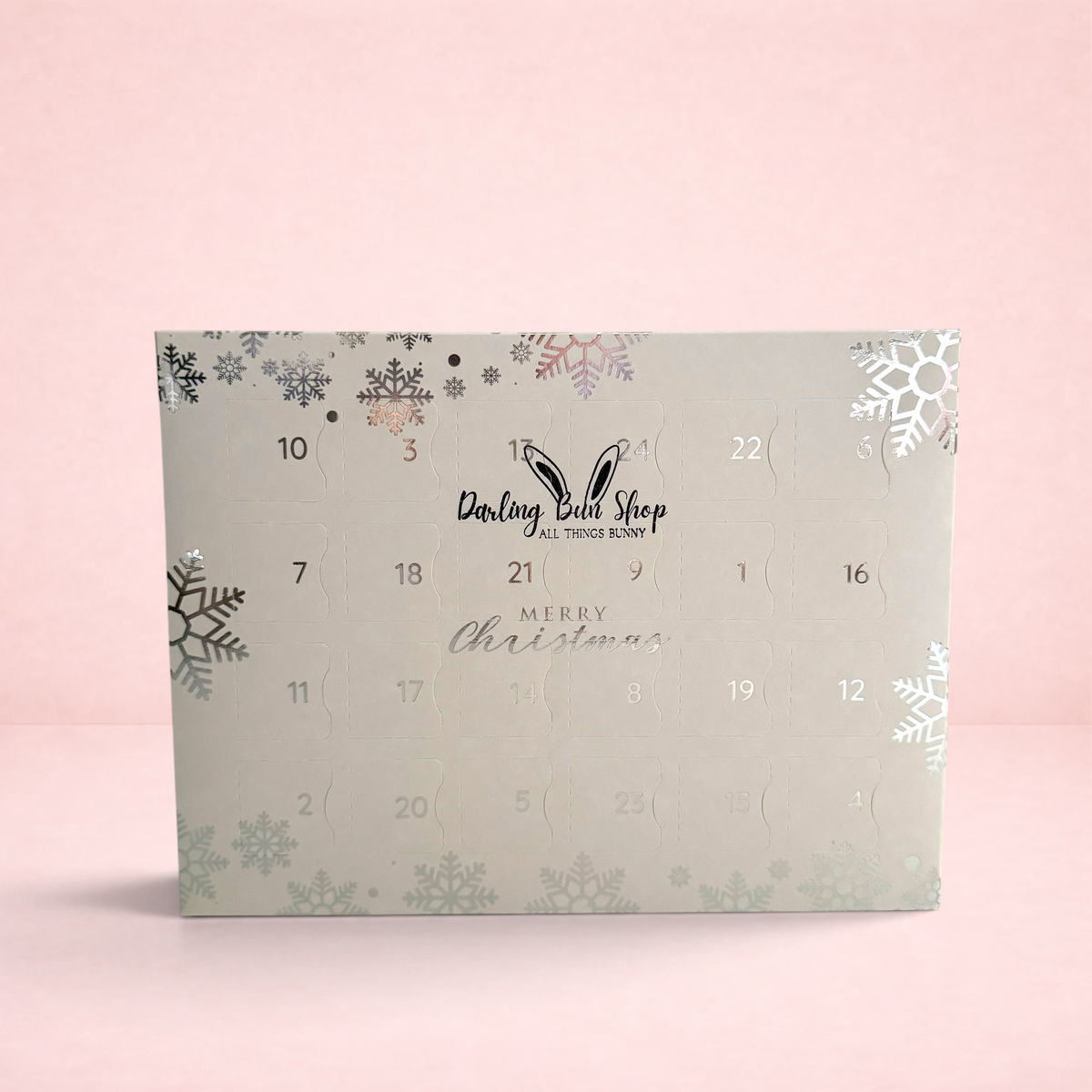 Darling Bun Shop 24 day hay-based treat advent calendar for small pets with silver snowflake festive design