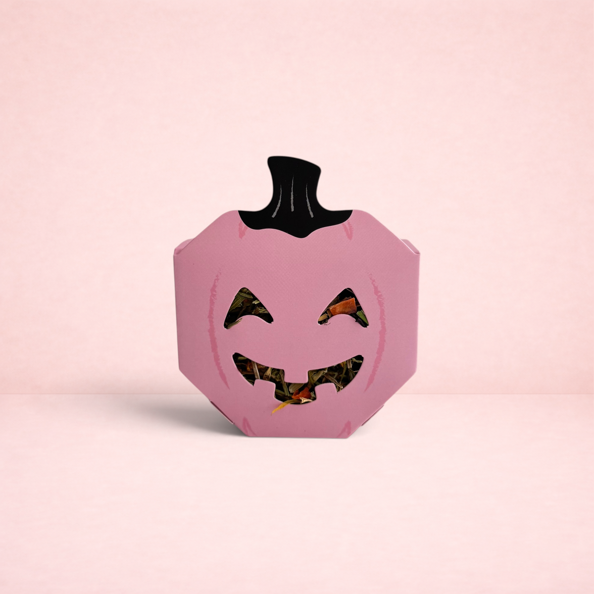 Darling Bun Shop pink pumpkin boredom breaker toy filled with forage for rabbits and small pets