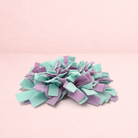Darling Bun Shop green and purple felt snuffle mat for small pets to encourage foraging and slow eating.