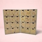 Darling Bun Shop reusable 24-day luxury forage advent calendar for small animals with festive gold numbered drawers.