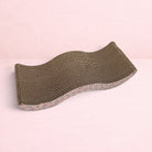 Darling Bun Shop pink wave-shaped cardboard scratching board for rabbits to dig, chew, and rest on.