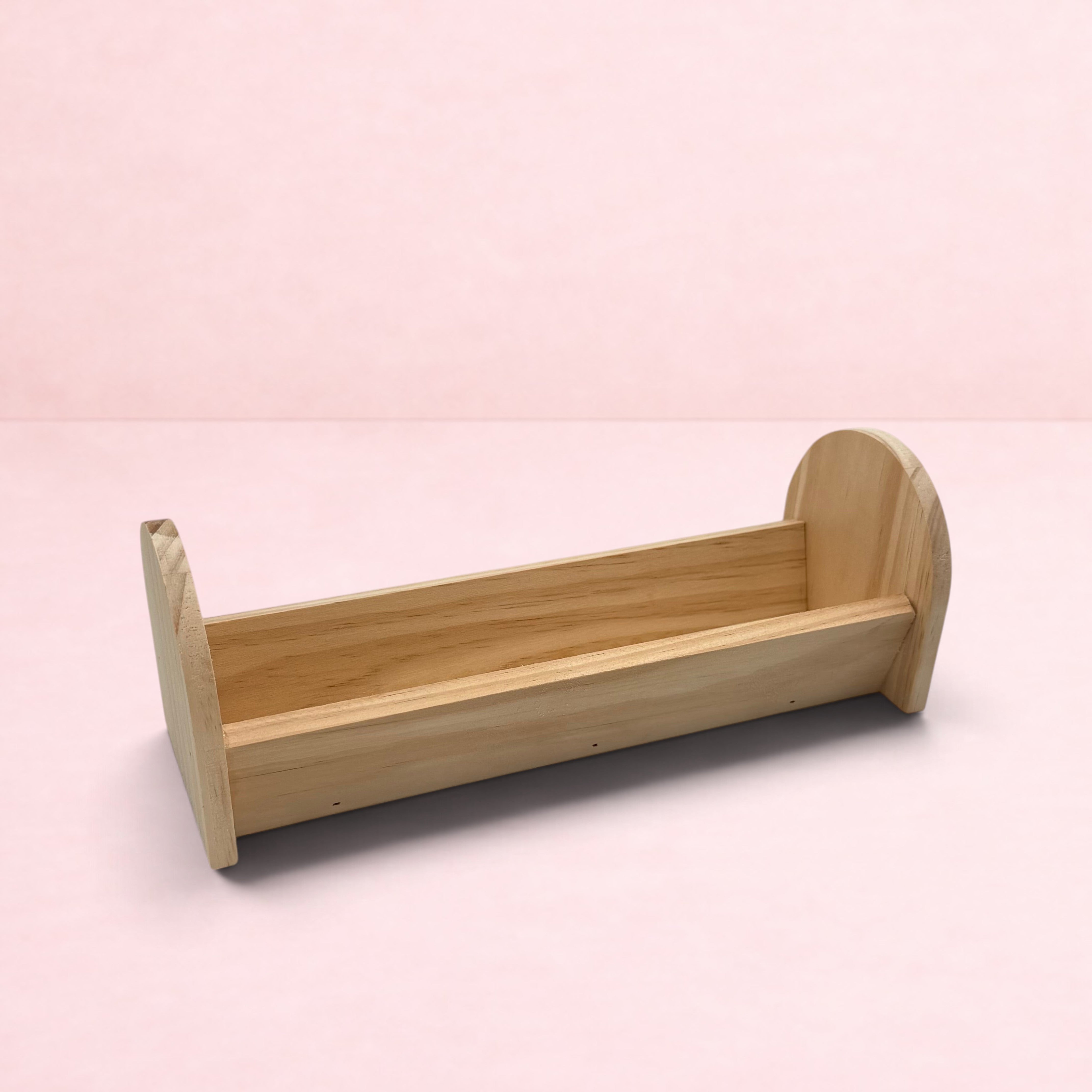 Darling Bun Shop natural wooden feeding trough for bunnies, perfect for holding hay and fresh vegetables.