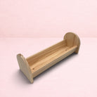 Darling Bun Shop natural wooden feeding trough for bunnies, perfect for hay and fresh vegetables.